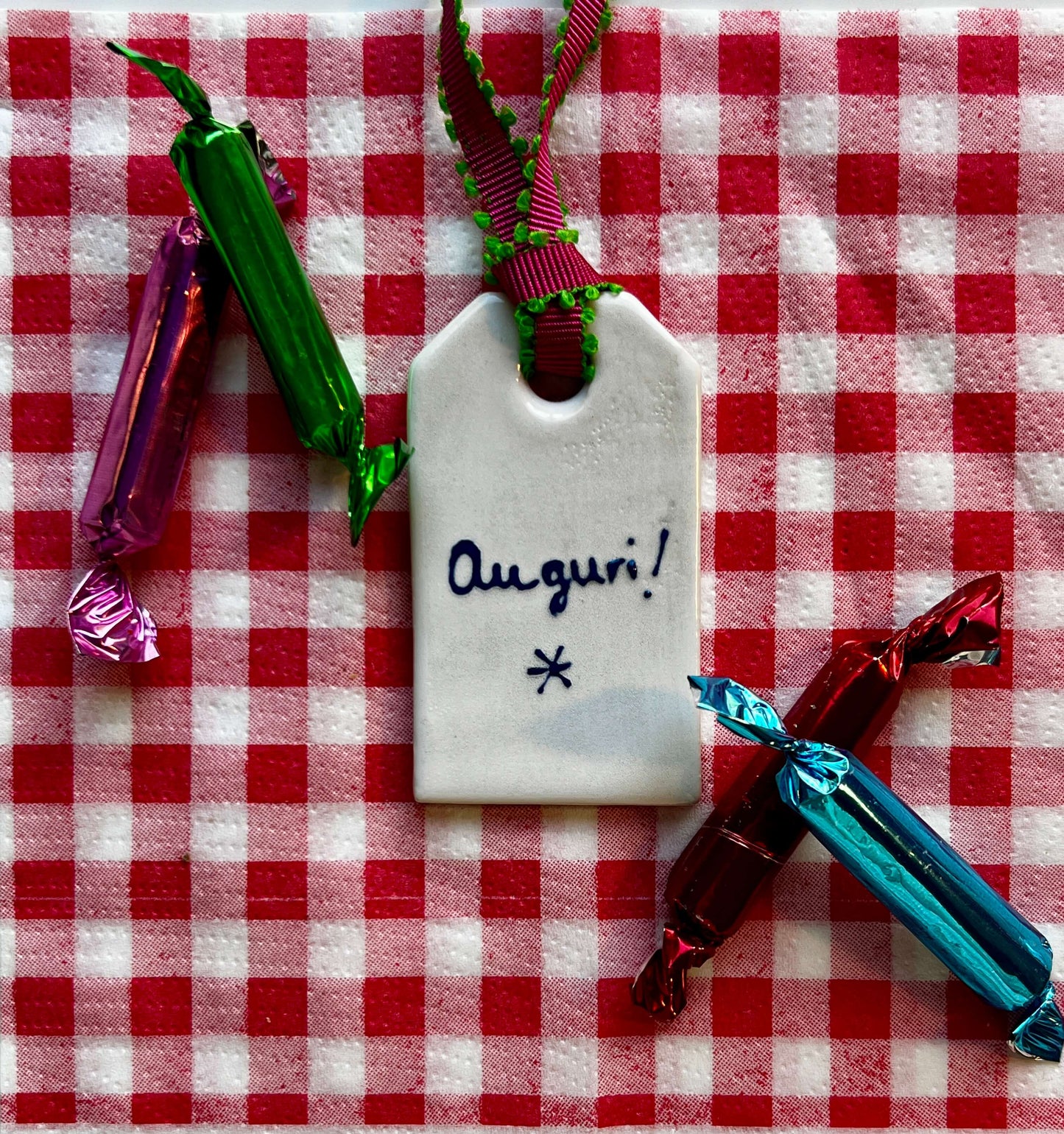 Handmadeceramic lable with writing Auguri by Stefanie Vietor