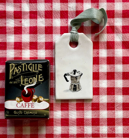 Handmade ceramic label with a printed illustration by Stefanie Vietor of a Moka