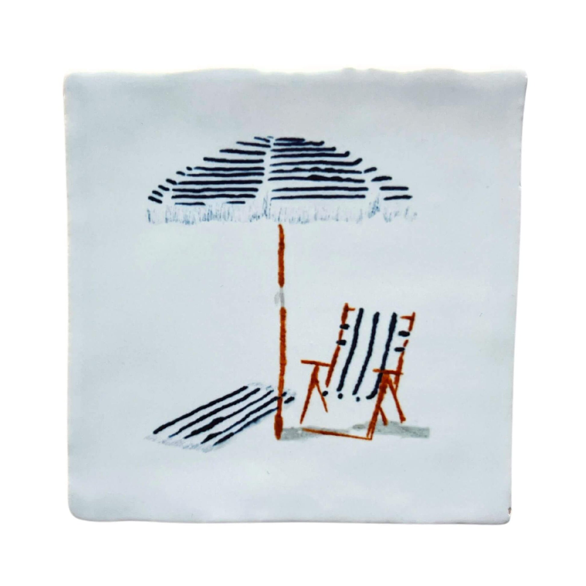 White irregular tile (witje) with prnted illustration by Stefanie Vietor of a blue  striped beach scene
